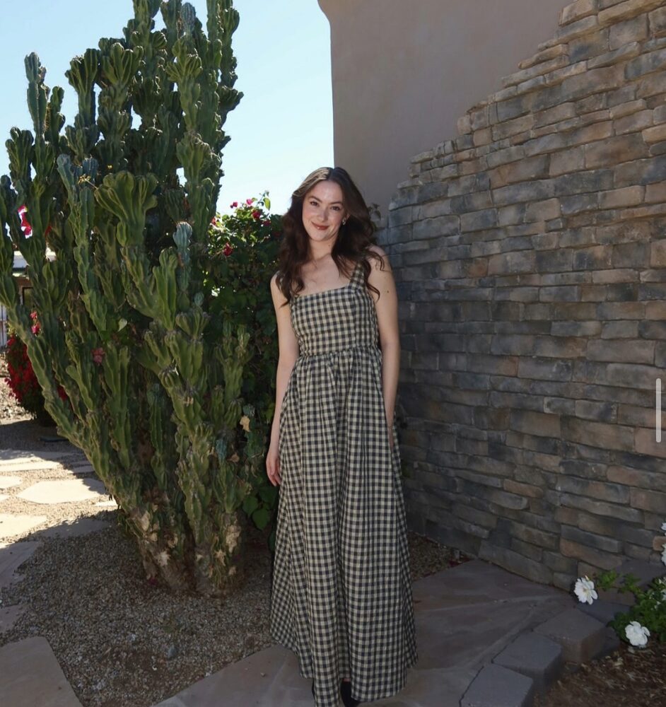 Gingham maxi dress styled outdoors beside a cactus